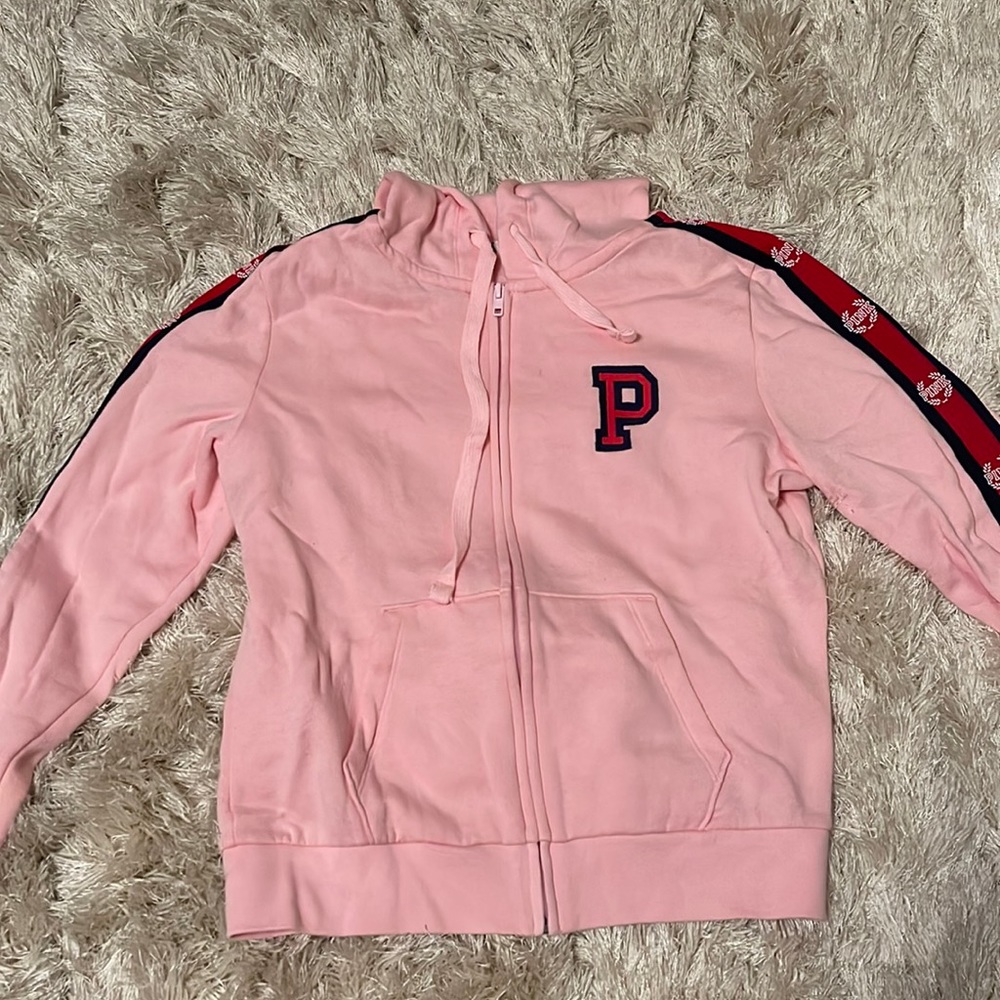 PINK full zip with red stripe of sleeve